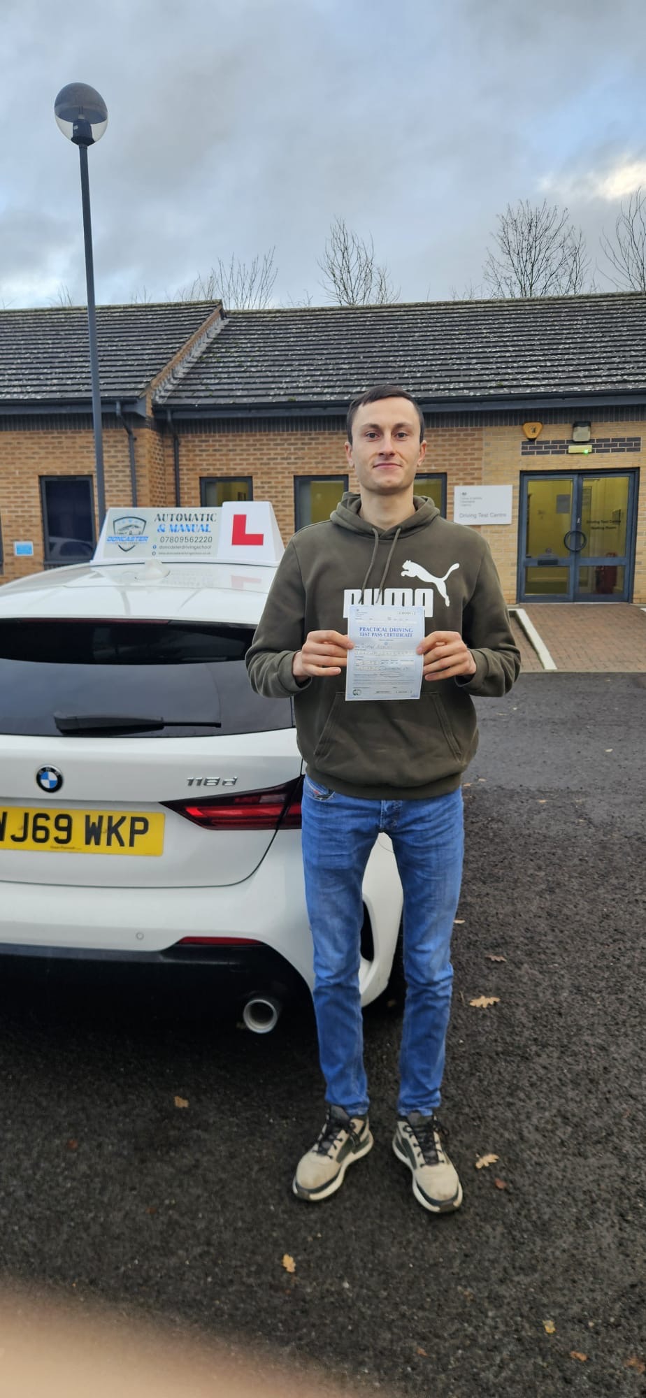 Learner driver completing manual driving lessons